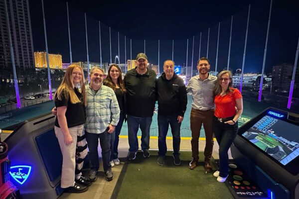 Celebrating partnership with Project 3 Consulting at Topgolf, sponsored by PWC