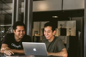 Two people reviewing next year's MarTech plans